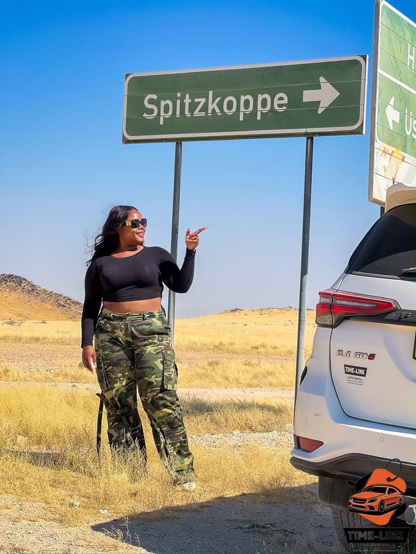 Cruise passenger with a Time-Link vehicle near Walvis Bay, Namibia